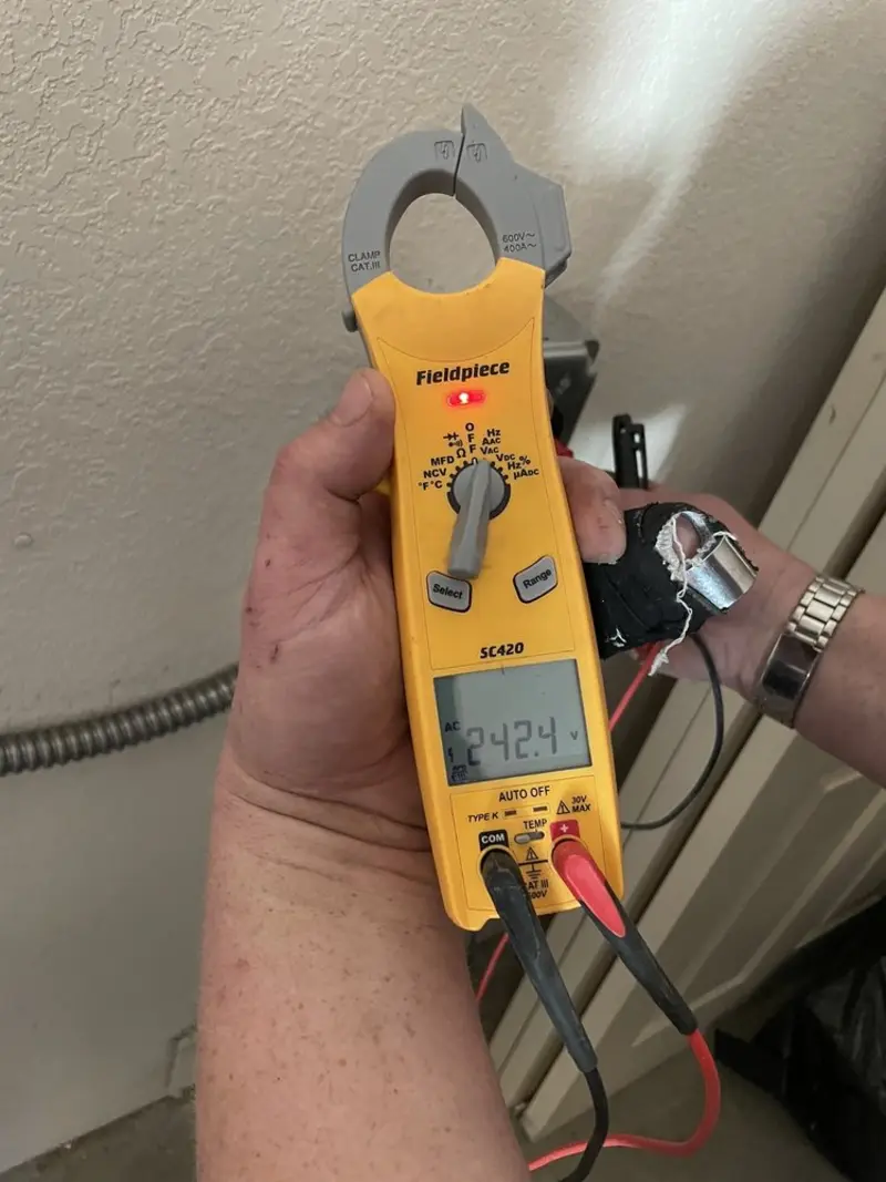 Voltage testing with clamp meter during Generator Installation in Brooklyn